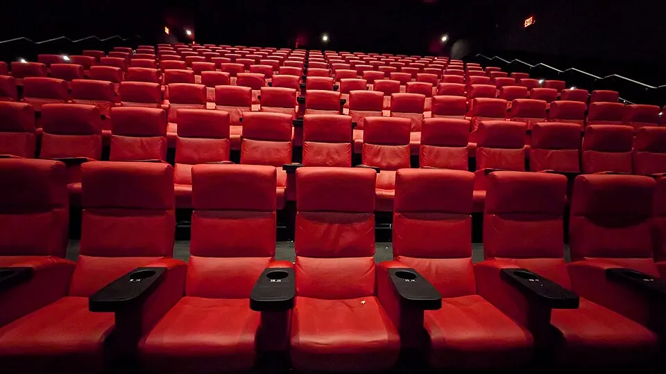 We thought we were the only ones at this 9:10 pm showing of "Wolf Man"; on the way out, we saw there was one person, apparently homeless, sl